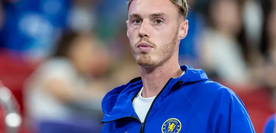 Player in Chelsea training gear on sidelines