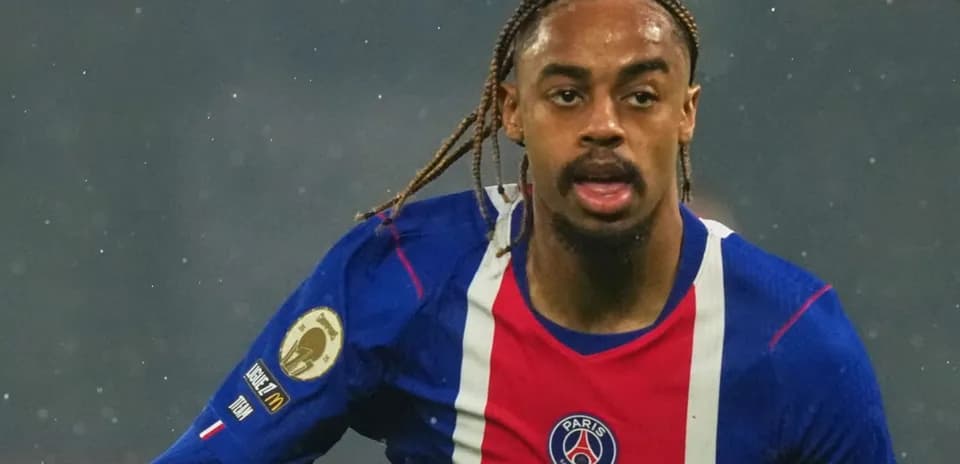 Player in action wearing Paris Saint-Germain jersey