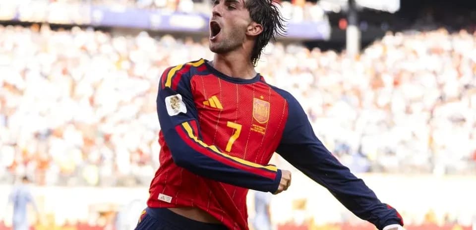 Player celebrating a goal for Spain during match