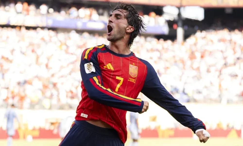 Player celebrating a goal for Spain during match