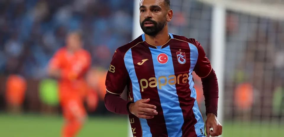 Trabzonspor player running during UEFA match