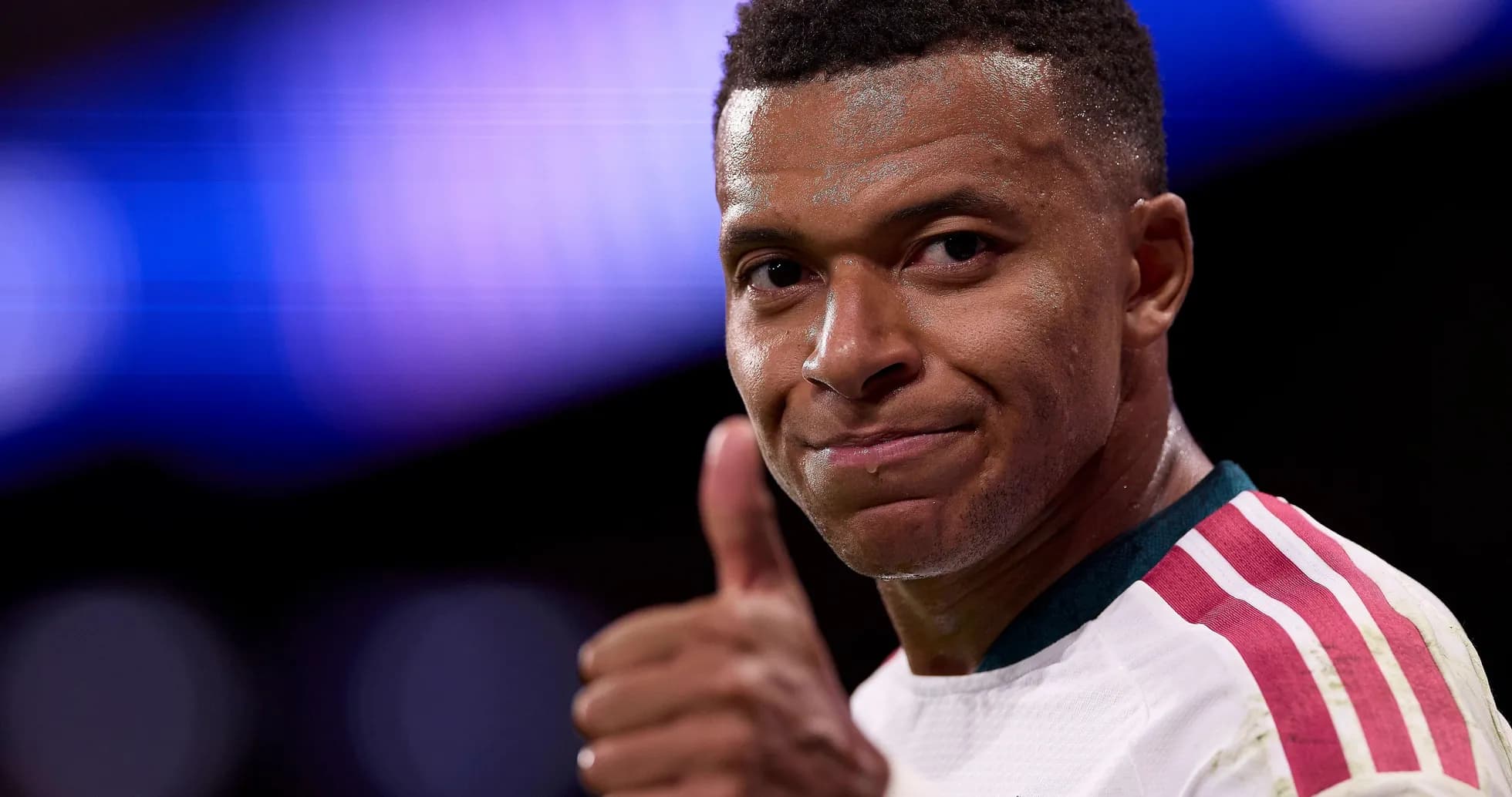 Player giving thumbs up after match