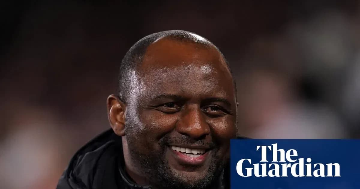 Man smiling during a football match event