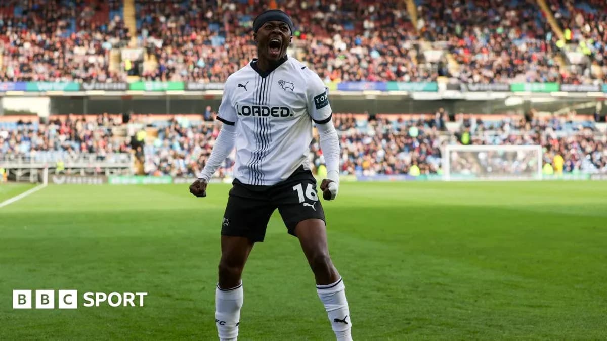 Player celebrating a goal on the pitch