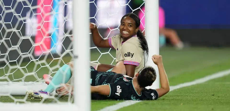 Player celebrating a goal in NWSL match