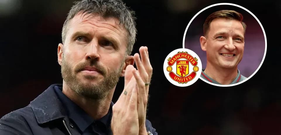 Coach applauding with Manchester United logo in background