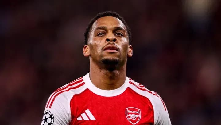 Arsenal player in red kit during match
