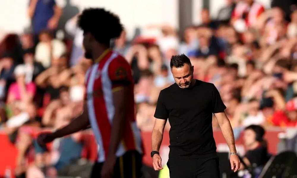 Manager walking off the pitch during match