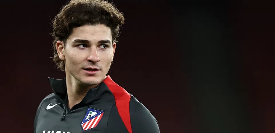 Player wearing Atletico Madrid training gear looking sideways
