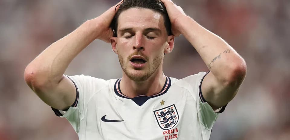Player holding head in disappointment during match