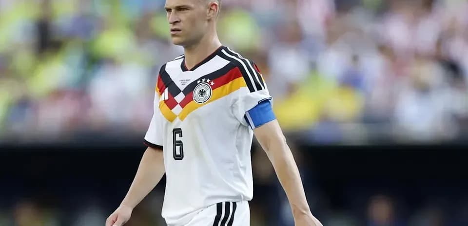 Player wearing Germany jersey walking on the field