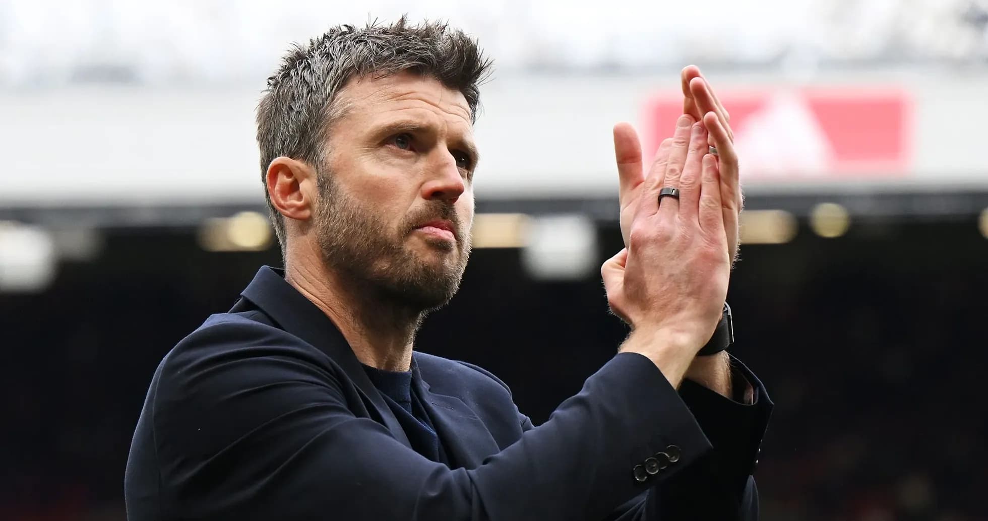 Man applauding during a match at stadium