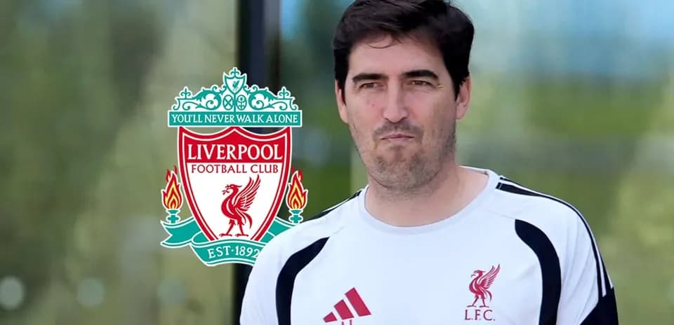 Coach walking in Liverpool FC training gear