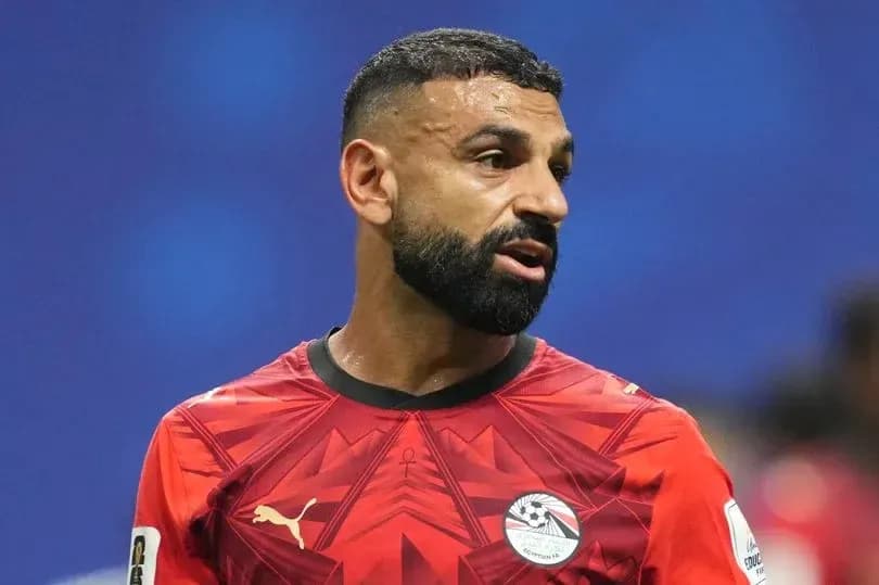 Player in red jersey during football match