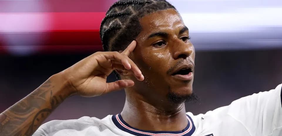 Player celebrating with hand gesture during match