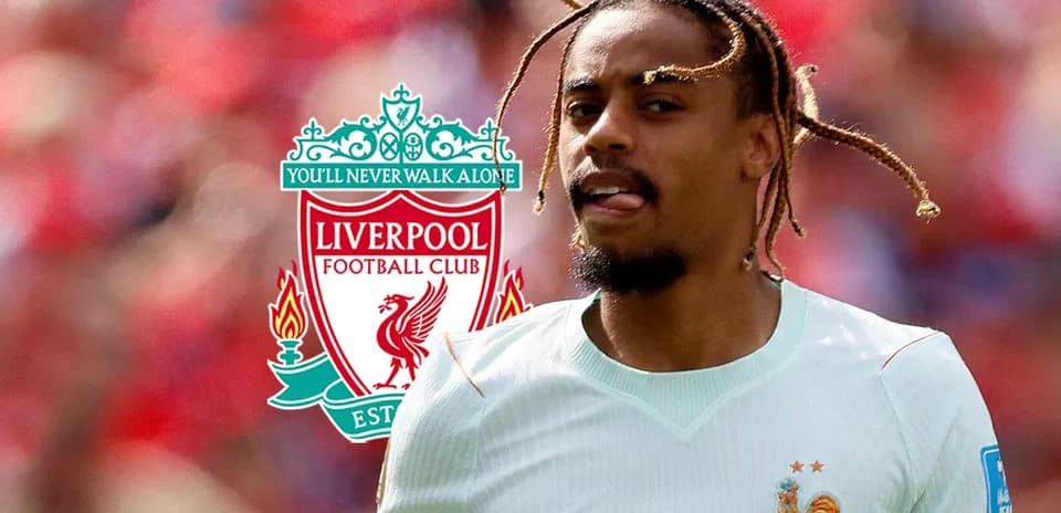 Player in action with Liverpool logo in background