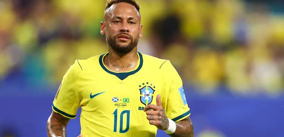 Neymar running in Brazil's yellow jersey during match