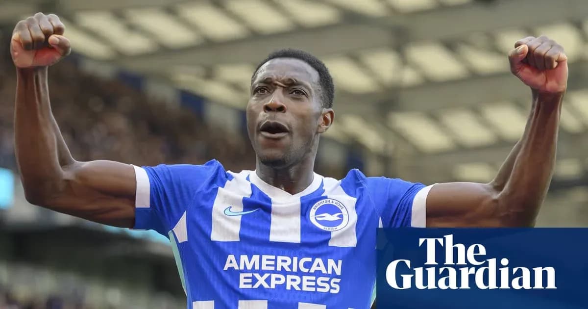 Player celebrating a goal in Brighton kit