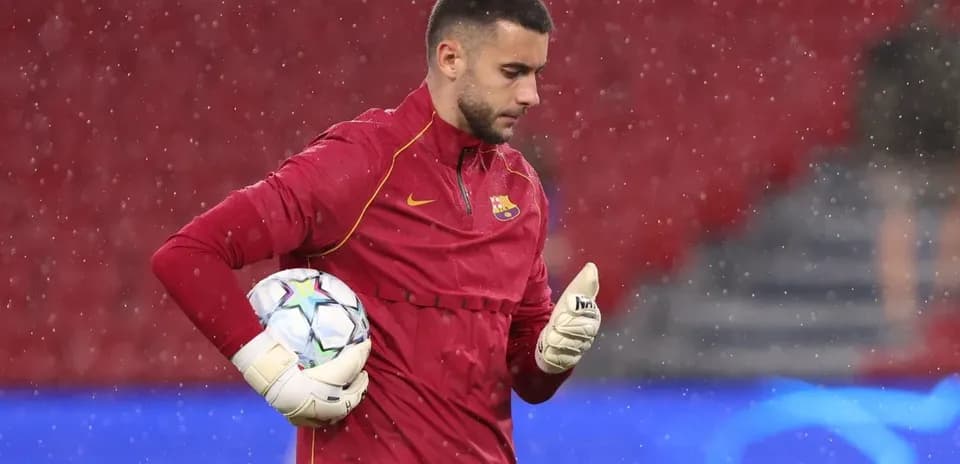 Goalkeeper in training during rainy weather