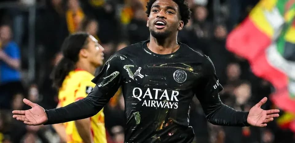 Player celebrating during a match in black jersey