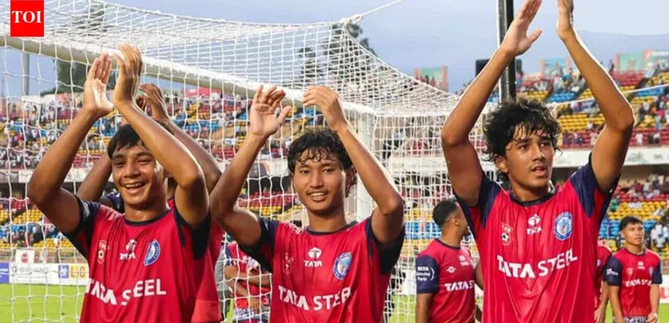 Three players celebrating after a match at stadium