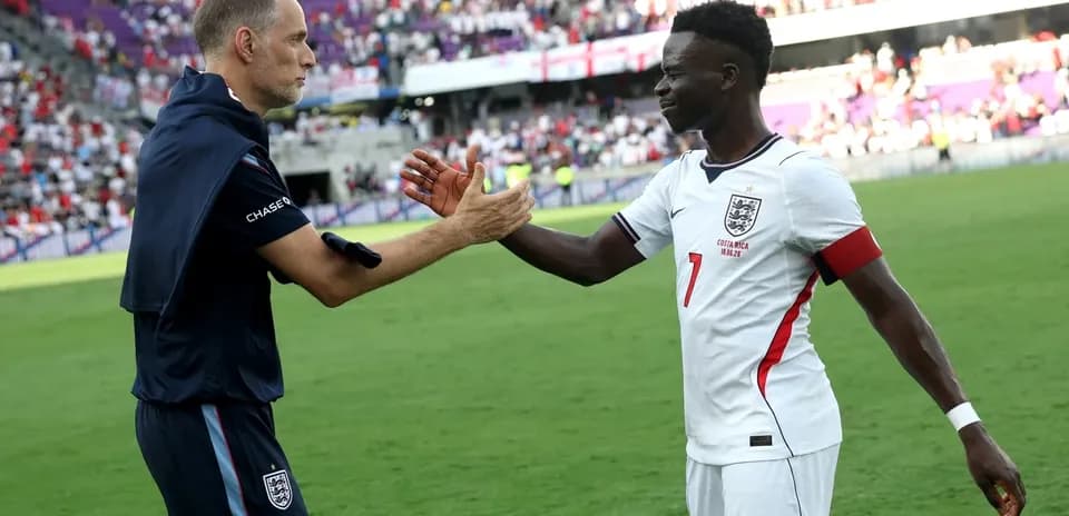 Manager and player shaking hands after match