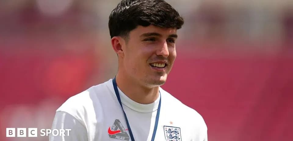 Player wearing England training kit at venue