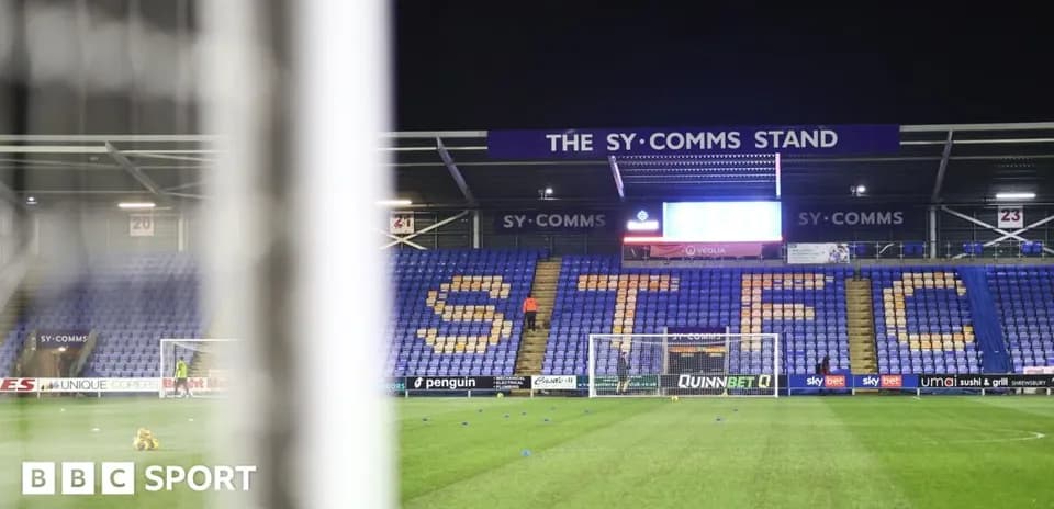 Shrewsbury Town stadium with goal and stands visible