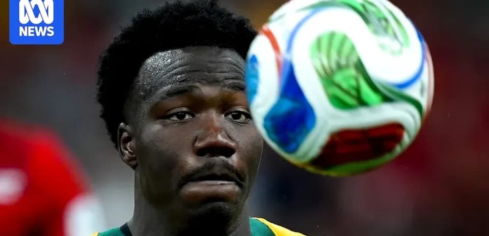 Player focusing on the approaching soccer ball