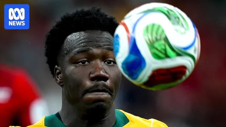 Player focusing on the approaching soccer ball
