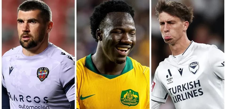 Three soccer players in different kits during match
