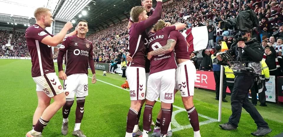 Hearts players celebrating a goal at Tynecastle