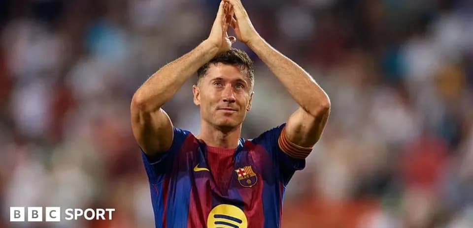 Player applauding fans during a match celebration