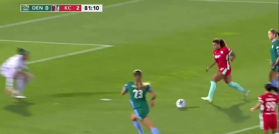 Player dribbling the ball during NWSL match