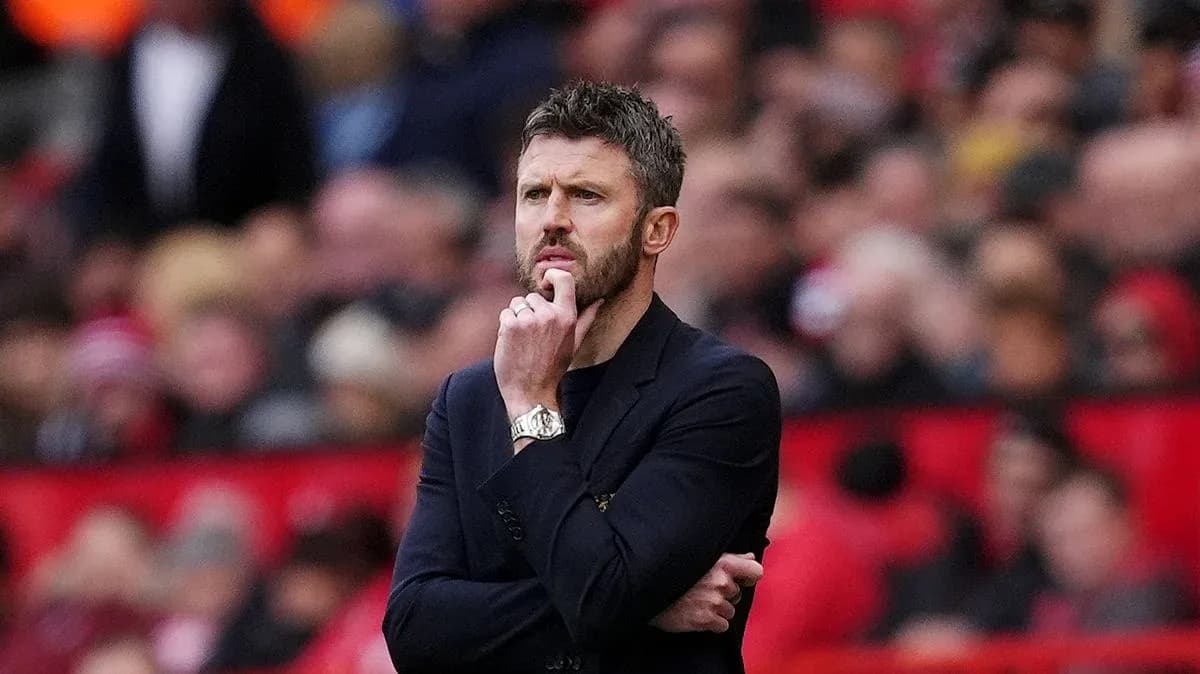 Coach observing the match from the sidelines