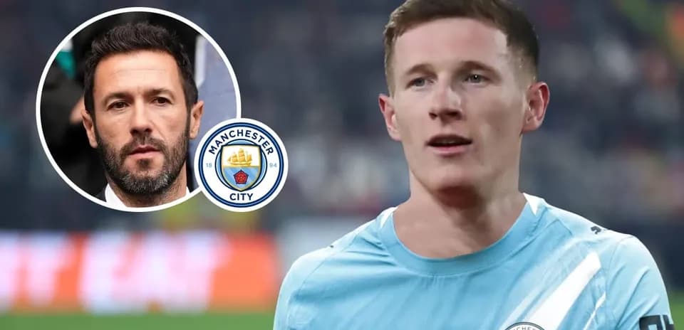 Manchester City player during match with logo