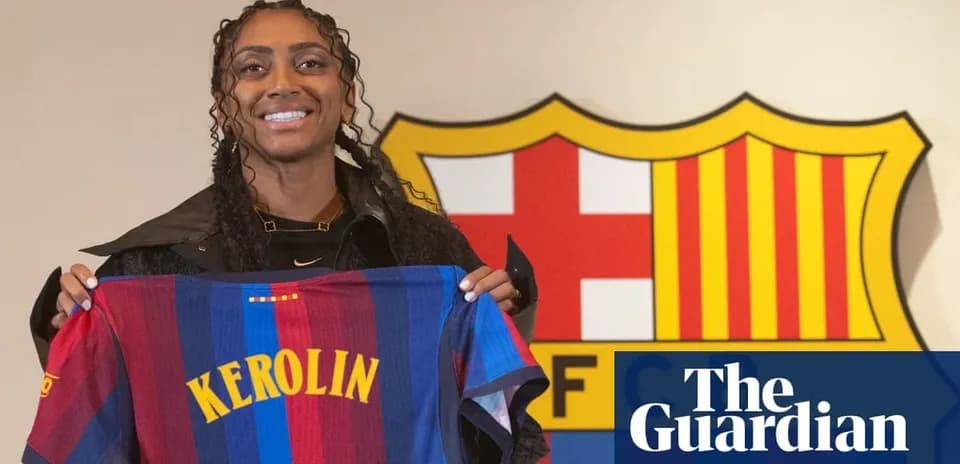 Player holding FC Barcelona jersey during presentation