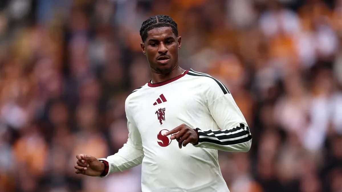 Player wearing white kit during match action