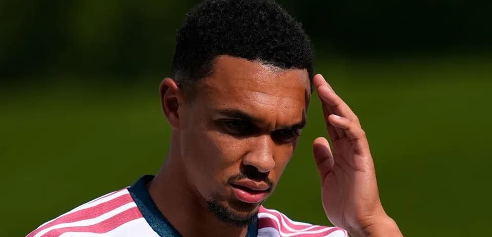 Player touching his forehead during training session