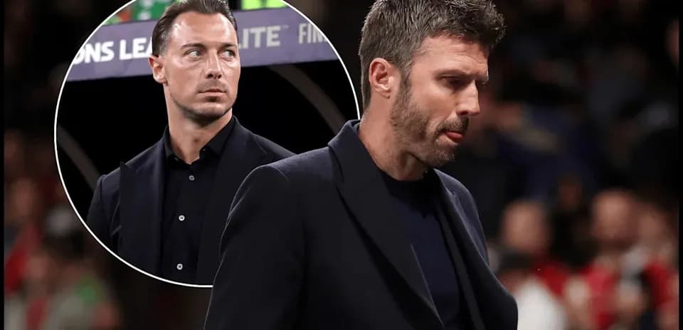 Two football coaches on the sidelines during a match