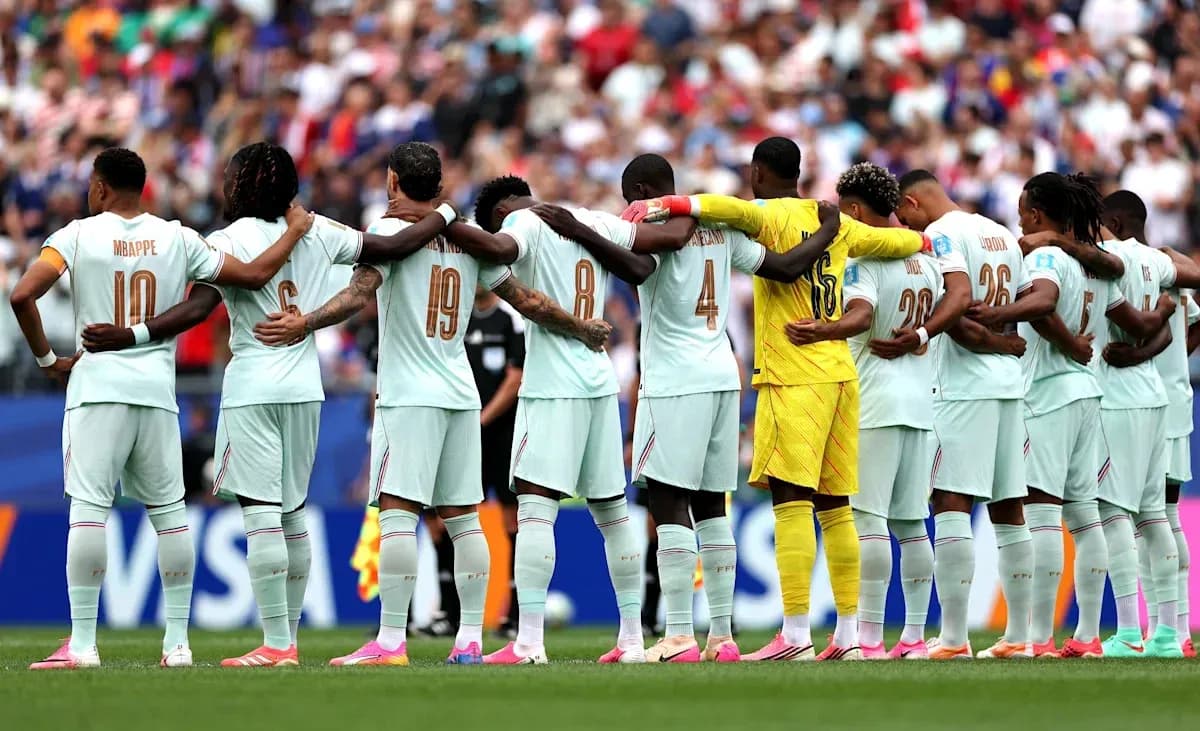 Players standing in line with arms around each other