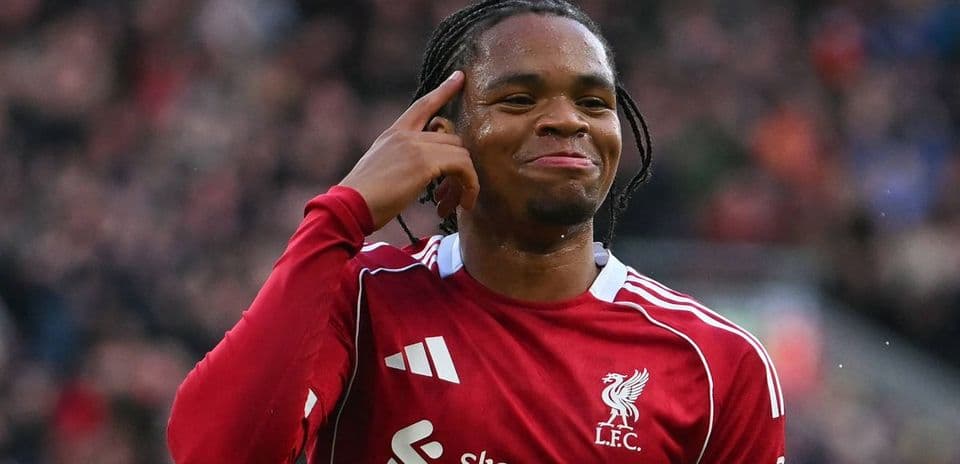 Player celebrating with finger gesture on pitch
