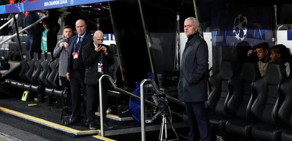 Manager observing from the technical area during match
