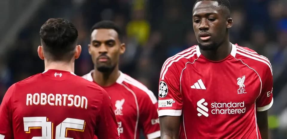 Liverpool players walking off the pitch during match