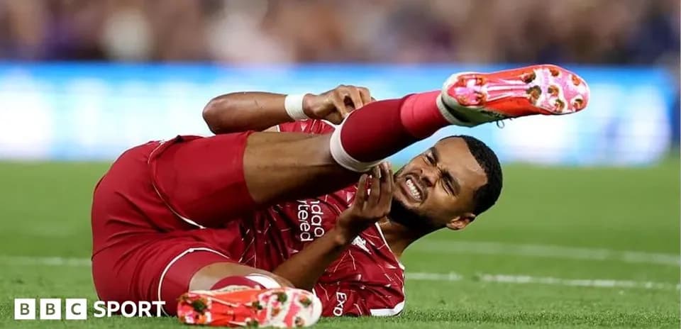 Player lying on the ground with leg injury