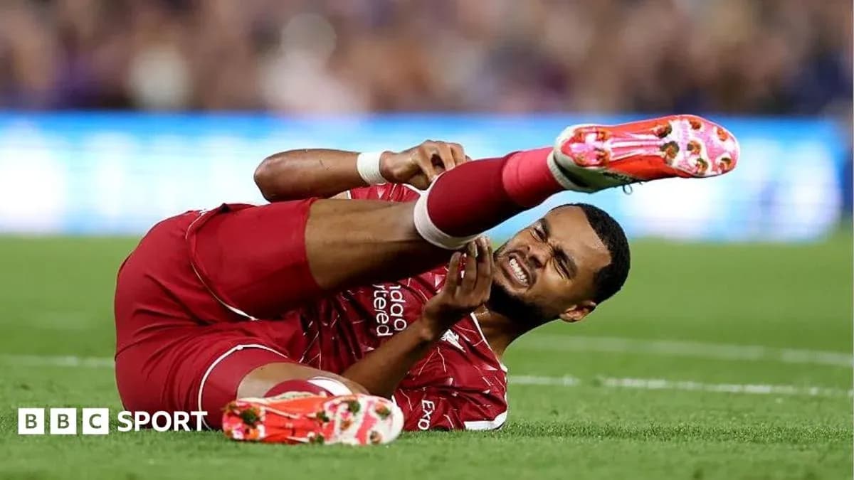 Player lying on the ground with leg injury