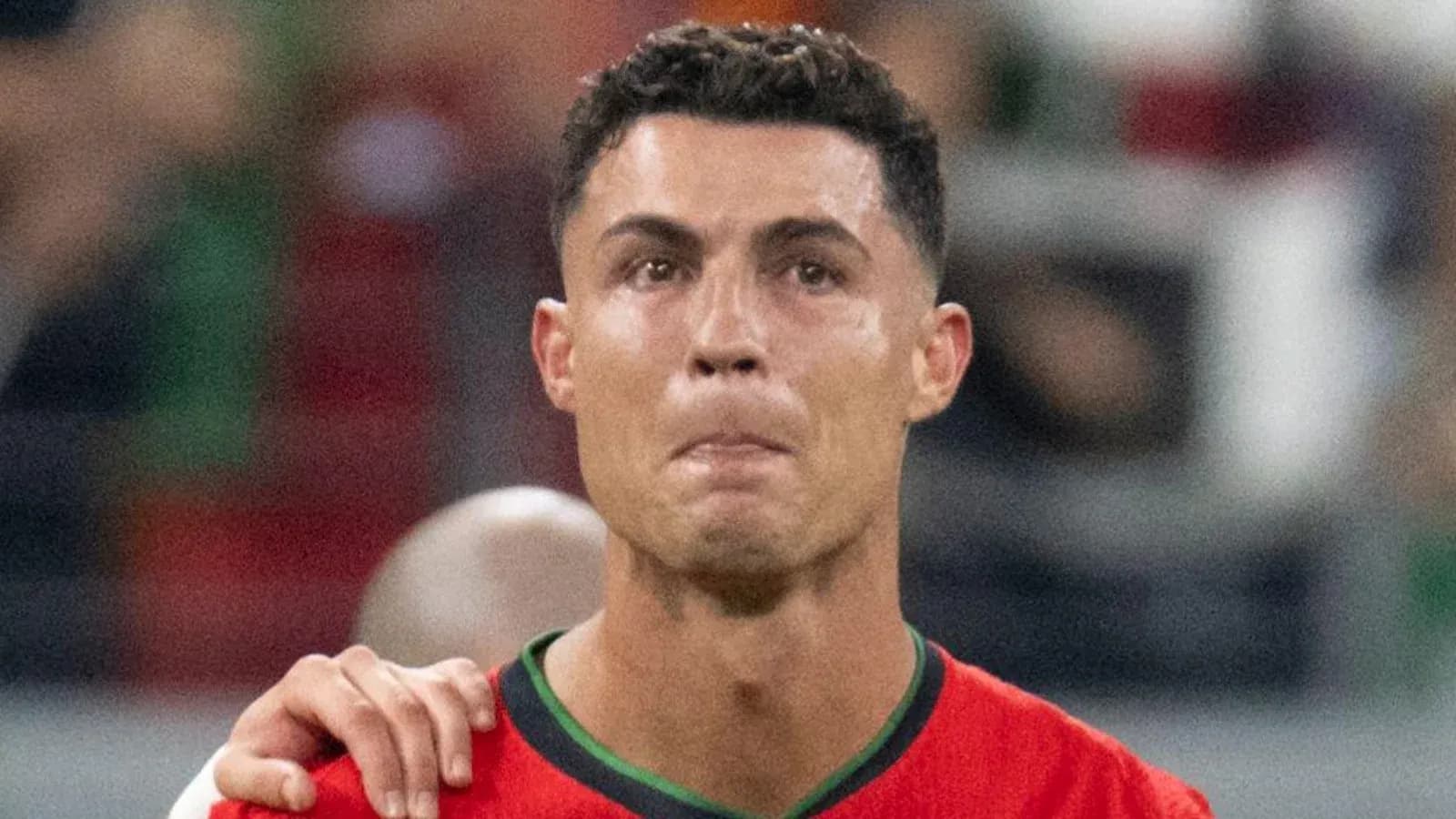 Player in red jersey during match close-up