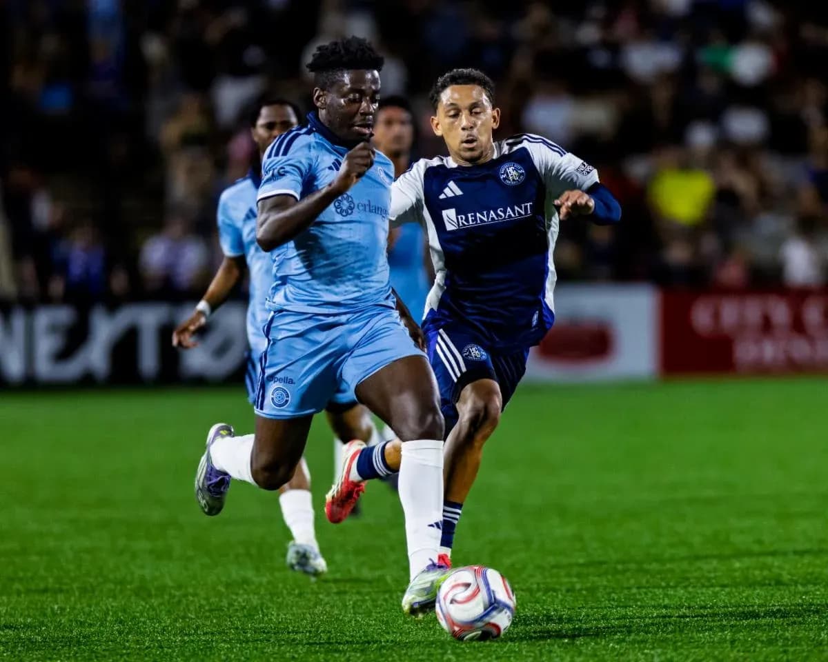 Player sprinting with ball during match