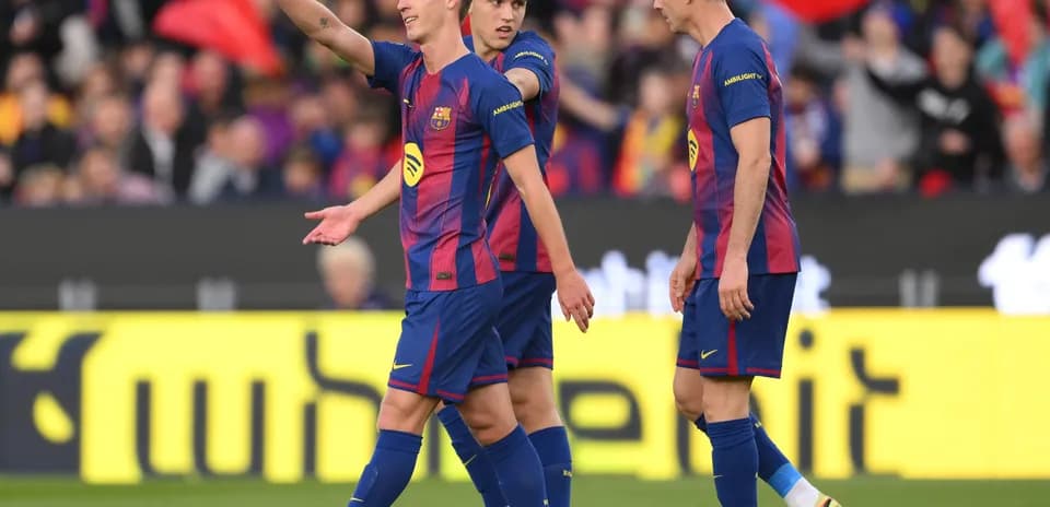 Barcelona players celebrating during La Liga match