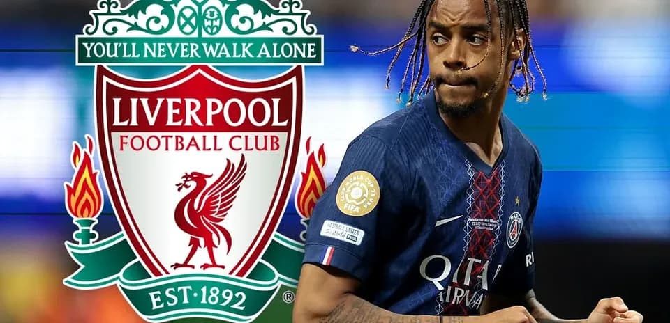 Player in PSG kit with Liverpool logo in background